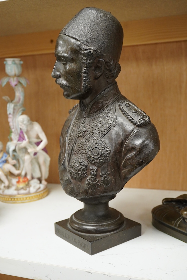 A spelter bust of General Gordon Pasha, and a bronze resin reclining female after Poullain, the bust 32cm